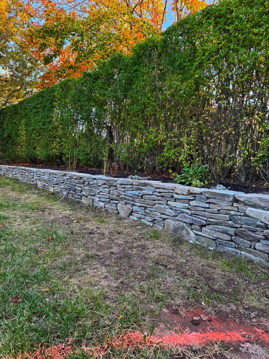 Natural stone wall in fall