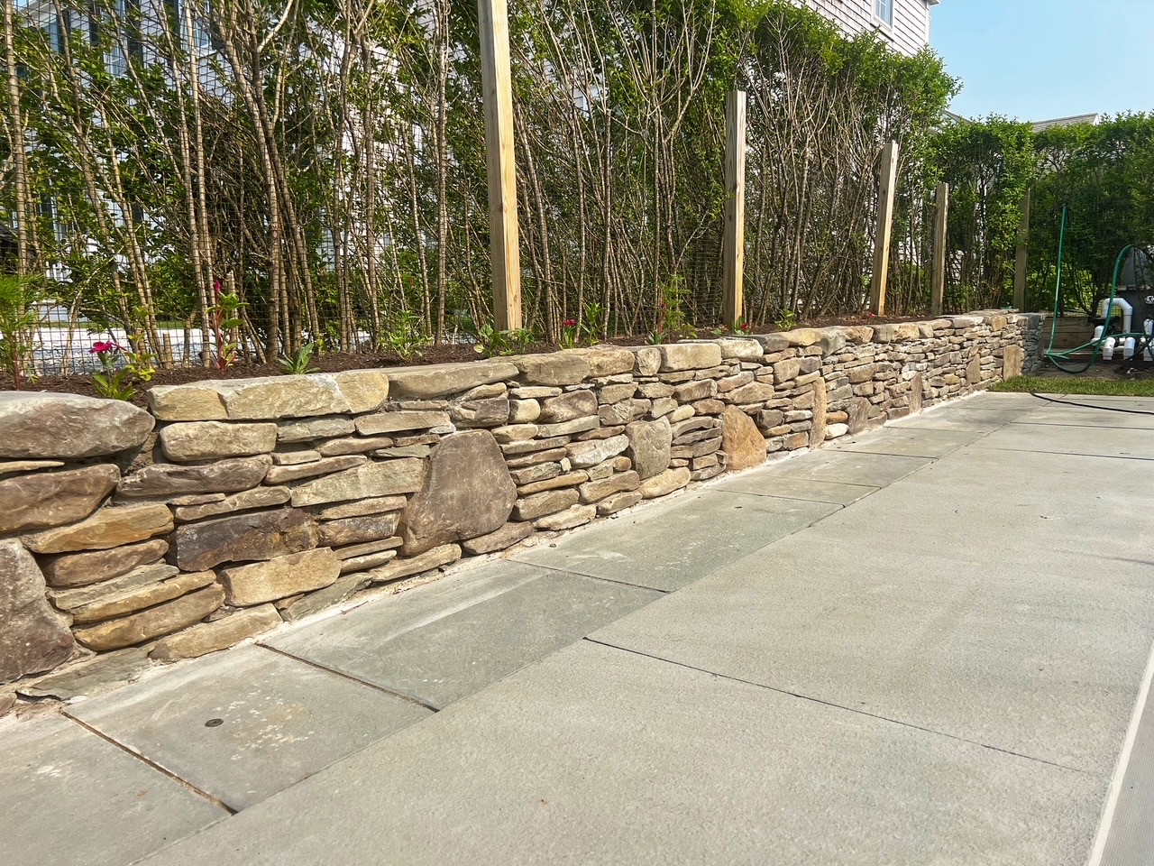 Stone wall at patio edge