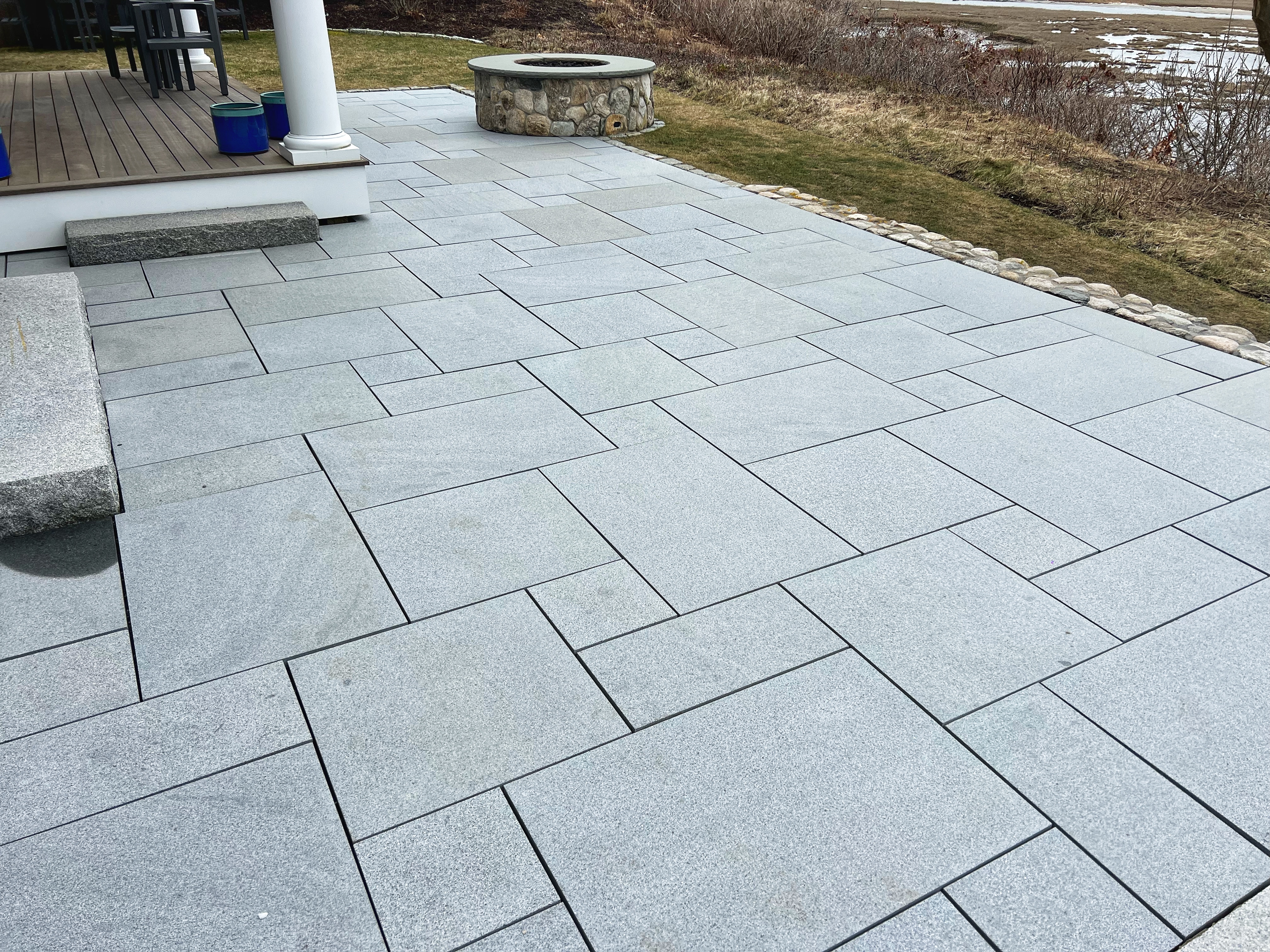 Granite patio with stone fire pit