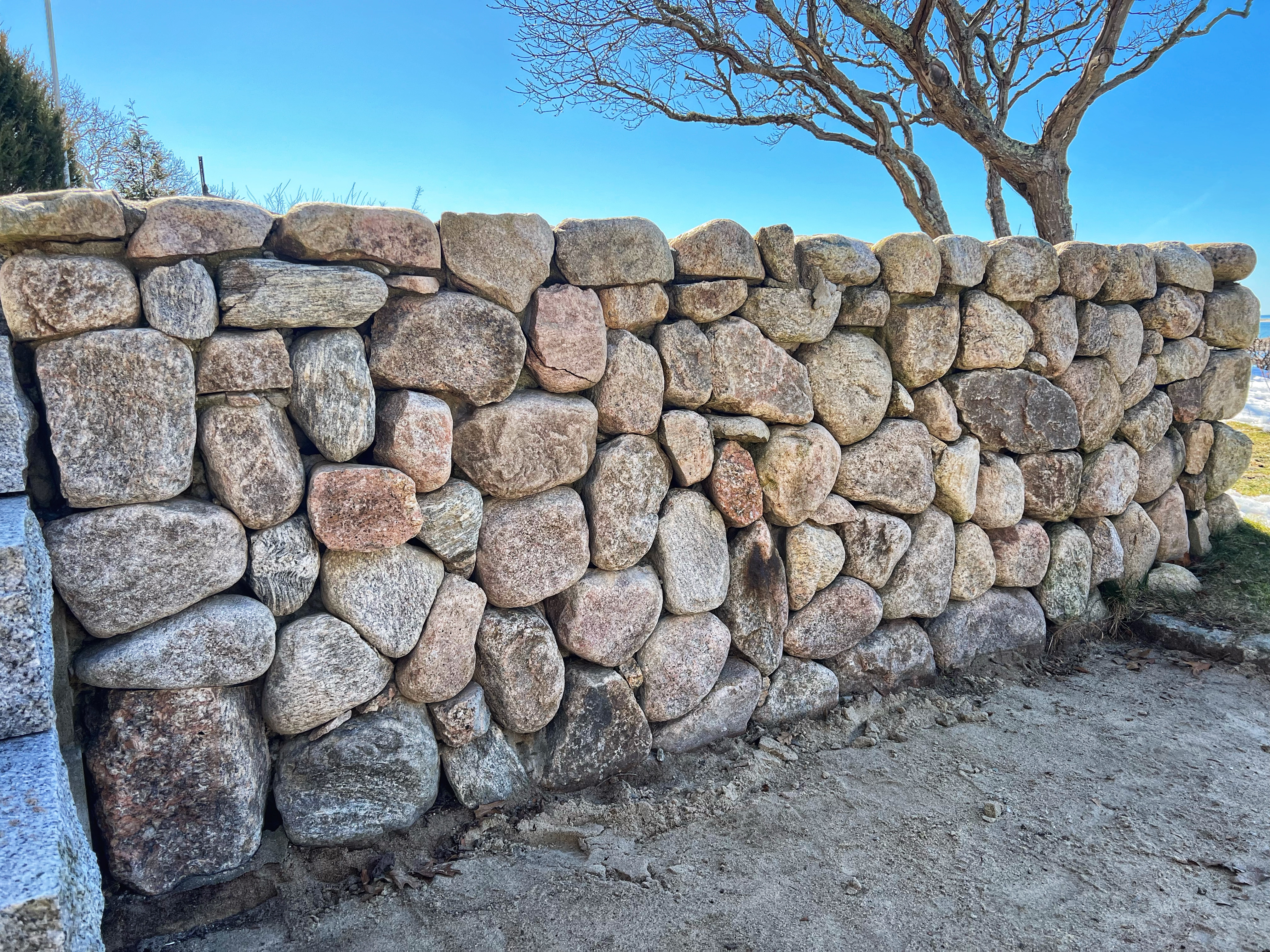 Dry-stacked fieldstone wall